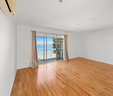 STUNNING LAKEVIEW LIVING - 3 BEDROOM HOME IN PRIME LOCATION - Photo 1