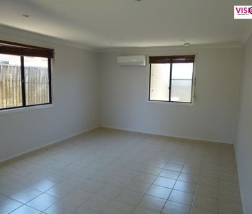 Charming 3-Bedroom Home Close to CBD with Spacious Yard & Powered Shed - Photo 1