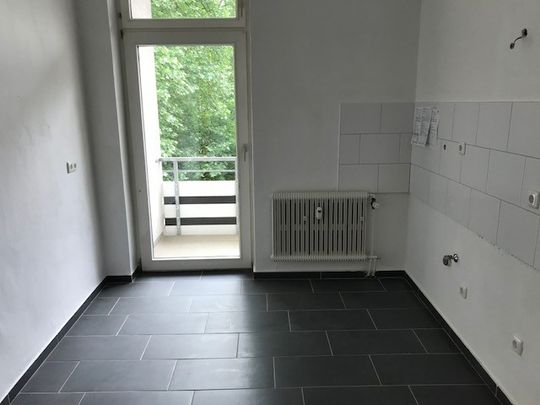 Helle Erdgeschoß-Wohnung einfach zum Wohlfühlen! - Photo 1