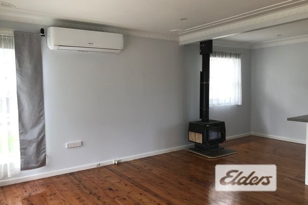 Convenient Home with Modern Kitchen & Bathroom - Photo 1