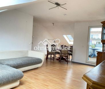 Charmante Dachgeschosswohnung mit Loggia in ruhiger Lage – Im Schac... - Foto 1