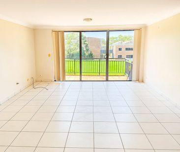 Top Floor 2-Bedroom Unit in a Secure Complex - Photo 1