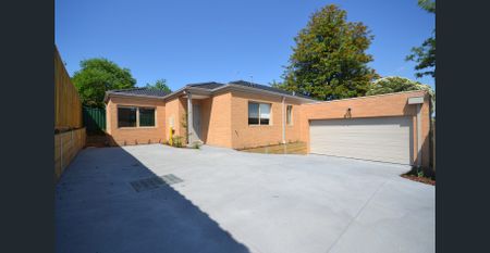 Modern & Low-Maintenance Home with Double Garage - Photo 2