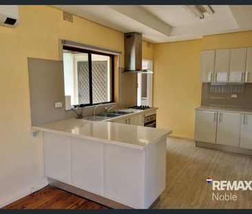 Three Bedroom Home on Quiet Street - Photo 1