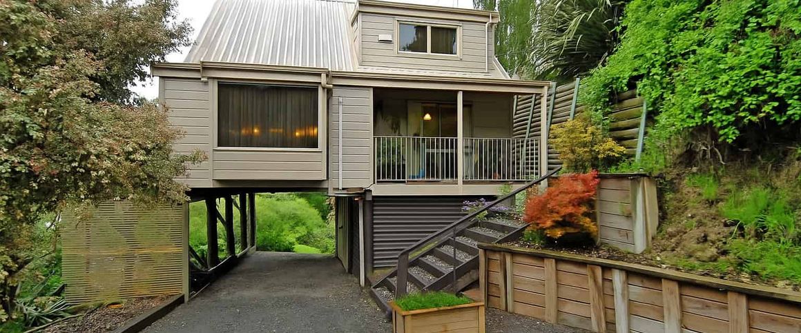 Tidy Two Level Home – Central Location - Photo 1