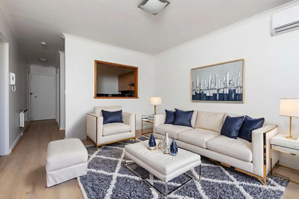 Two-Bedroom Gem with Secure Parking in a Winning Location! - Photo 1