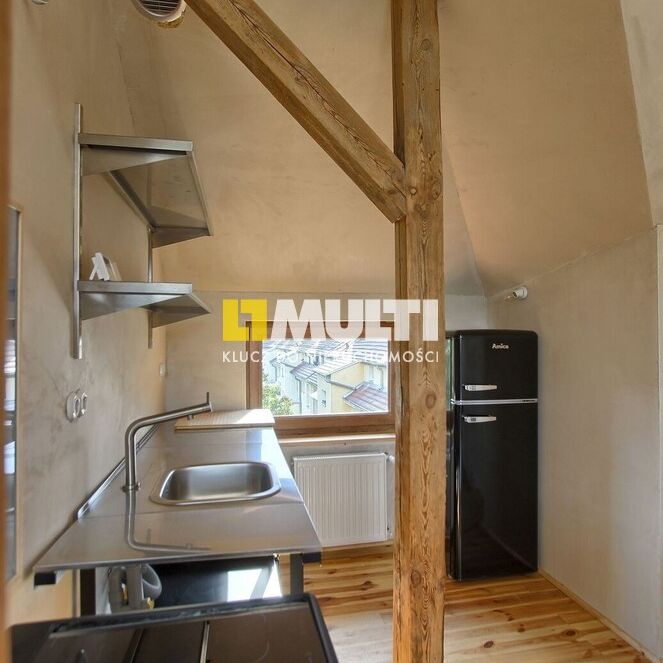 Wyjątkowe, klimatyczne mieszkanie na poddaszu - Zdjęcie 1