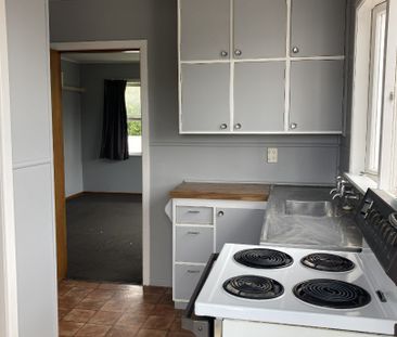 This two-bedroom unit offers comfortable, low-maintenance living in... - Photo 3