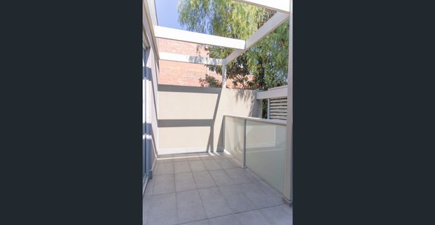 Chic Two-Bedroom Apartment in the Heart of Armadale - Photo 1