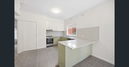 Beautifully refreshed throughout with brand new finishes and thoughtful updates - Photo 4