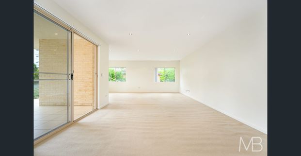 ELEGANT & CONVENIENT LIVING IN A QUIET YET CONNECTED LOCALE - Photo 1