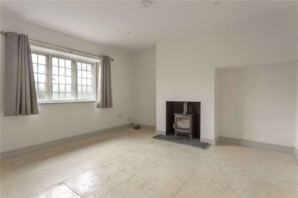 A beautiful two bed cottage located in the quaint village of Hawling - Photo 1