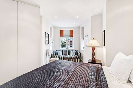 An exceptional two bedroom located close to Harrods with air conditioning and 24 hour porter. - Photo 5