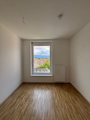 Sonnige - 3-Zimmer-Wohnung im Obergeschoss mit Balkon und Dachterrasse! - Photo 2
