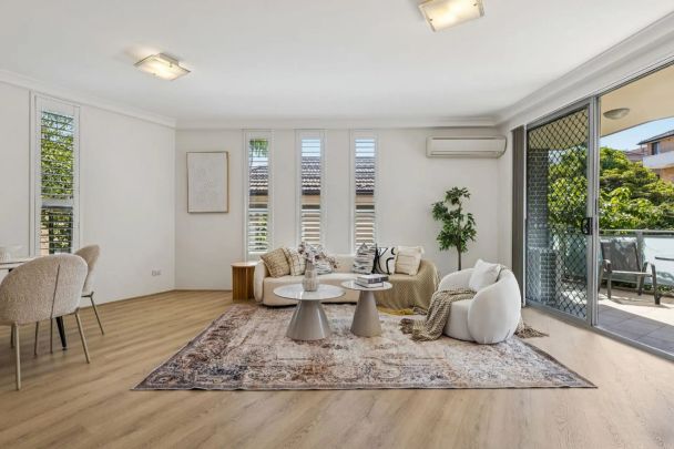Spacious with Stylish Interiors, Ultra-Convenient 2 bedroom Unit - Photo 1