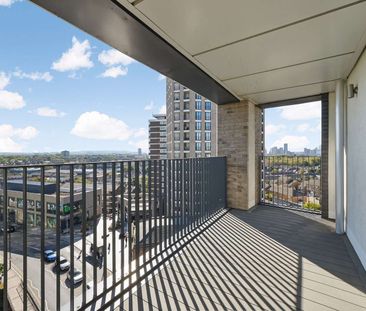 Modern two-bedroom apartment with open-plan living, a private balcony, contemporary finishes and access to a communal roof terrace. - Photo 5
