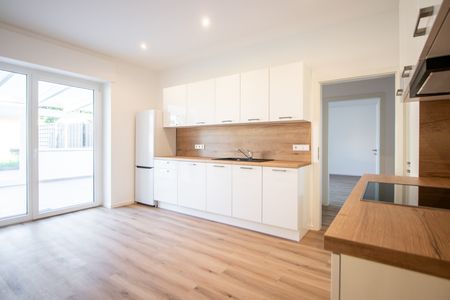 Kernsanierte Erdgeschosswohnung mit Garten, Einbauküche und Wintergarten in Bielefeld Stieghorst - Photo 5