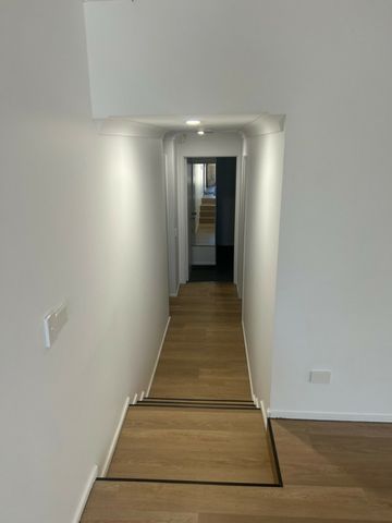 RENOVATED DUPLEX WITH POOL AND TENNIS COURT IN COMPLEX - Photo 4