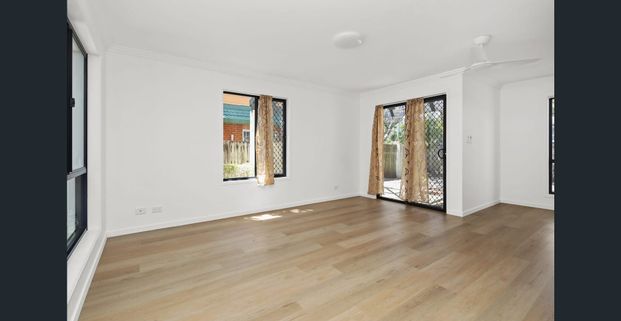 For Rent | Spacious 4-Bedroom Unit in the Heart of Southport - Photo 1