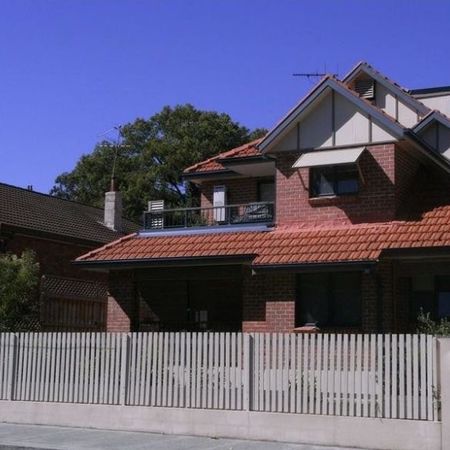 Quiet Comfort Meets Urban Convenience in This Ashfield Gem - Photo 4