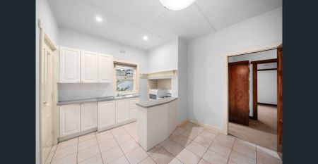 Top Floor Duplex Apartment with Private Balcony and Off Street Parking - Photo 3