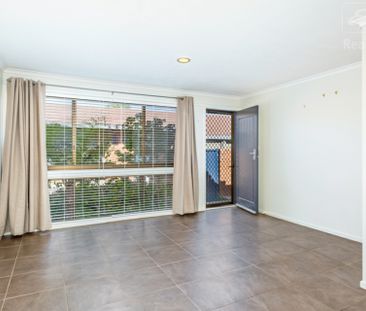 Fantastic Single Level Two Bedroom Townhouse with Garage - Photo 5