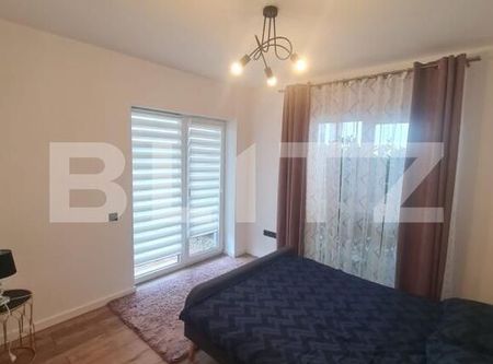 Apartament modern, 2 camere, 48 mp utili, terasa de 15 mp, zona Terra - Photo 2