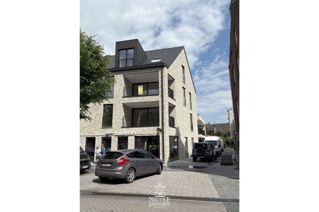 Nieuwbouwappartement met twee slaapkamers, terras en autostaanplaats in hartje Maaseik - Photo 5
