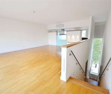 A unique four bedroom townhouse with direct views across the Marina... - Photo 2