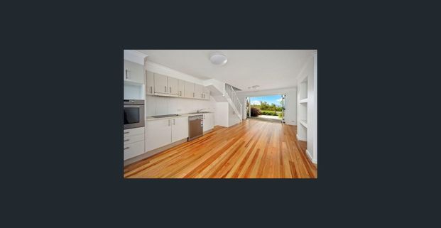 Stylish Townhouse Across From Beach - Photo 1