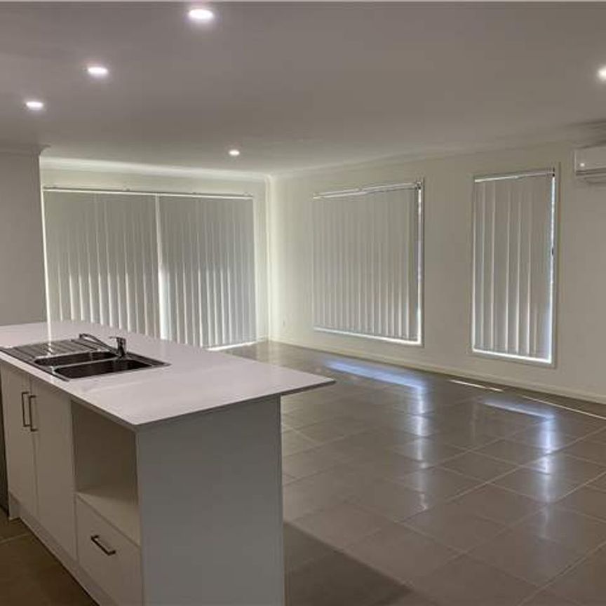 A stylish, easy-care home ready for you! - Photo 1