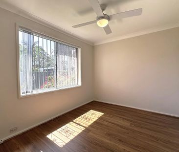 BEAUTIFULLY RENOVATED FAMILY HOME IN SOUGHT AFTER LOCATION - Photo 3