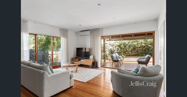 Spacious Three-Level Family Home with Multiple Living Areas and Double Garage - Photo 1