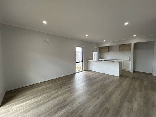 BRAND NEW FOUR BEDROOM HOME ! - Photo 1