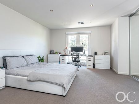 Open the Door to Spacious Family Living in Kensington's Prime Location - Photo 4