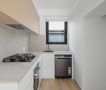 Stylish & Low-Maintenance Living in a Prime Location - Photo 4