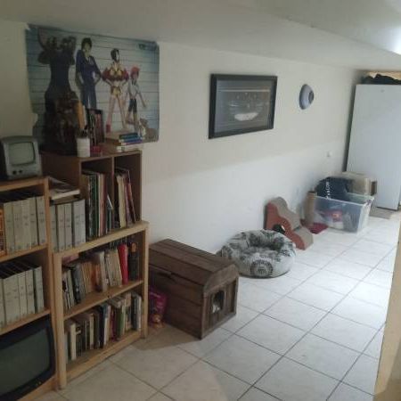 Semi Furnished room for rent in bright annex basement - Photo 1