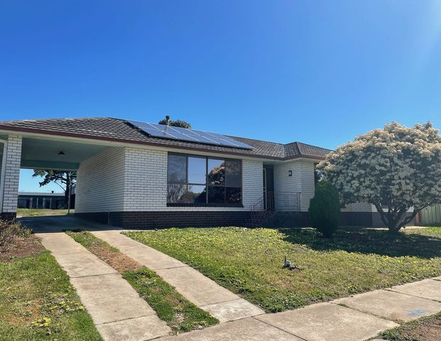 Comfortable Three-Bedroom Home with Impressive Town Views - Photo 1