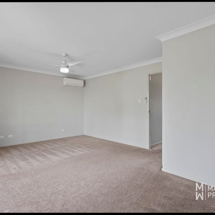 MODERN 4-BED FAMILY LIVING WITH SPACE, STYLE & CONVENIENCE - Photo 1