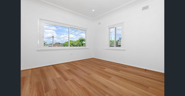 Generous Family Living in a Peaceful Street Location! - Photo 1