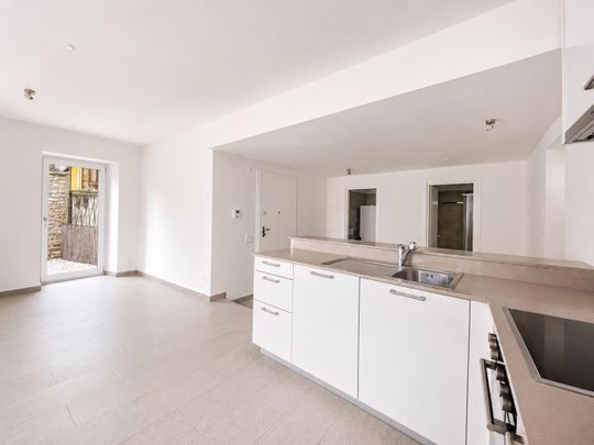 Manno_ Elegante 2.5 locali con ampio patio privato e finiture moderne - Foto 1