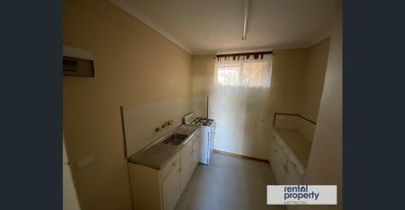 TIDY 2 BEDROOM UPSTAIRS UNIT - Photo 3