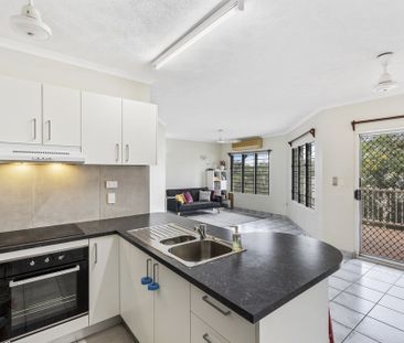 NEAT UNIT IN QUIET COMPLEX CLOSE TO SHOPS - Photo 1
