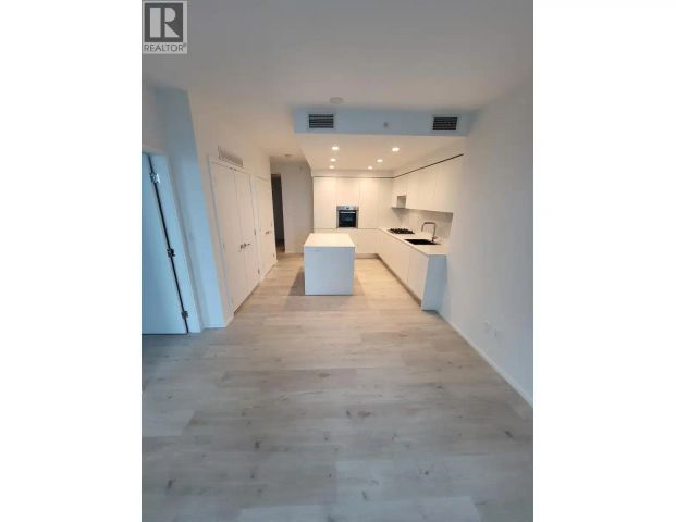 1606 3809 EVERGREEN PLACE — 2 Bedroom - Photo 1