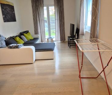 Moderne 3.5 Zimmer Wohnung mit Garten per sofort - Photo 1