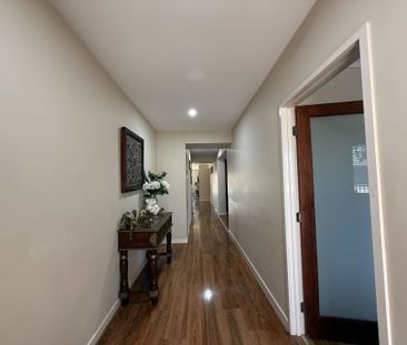 Spacious 4-Bedroom Home with Two Living Areas and Modern Upgrades - Photo 5