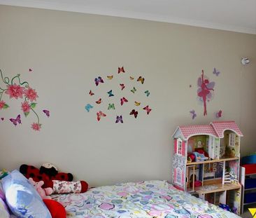This immaculate four bedroom home is both private and welcoming and... - Photo 6