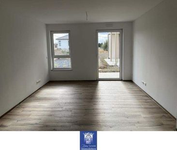 Wohlfühlwohnung mit Terrasse und moderner Ausstattung im Erstbezug!... - Foto 1