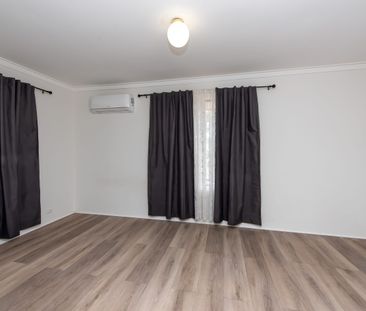 Location is everything! Available now. - Photo 4