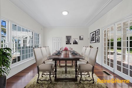 Elegant Family Residence with Pittwater Views and Timeless Charm - Photo 4